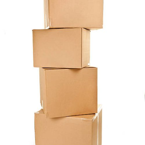 Stack of four large cardboard moving boxes isolated on white Stack of four large cardboard moving boxes isolated on white